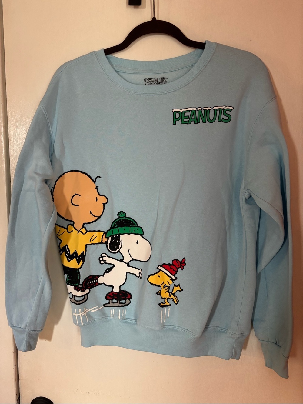Peanuts Light Blue Crewneck Sweatshirt with Ice Skating Graphic - Picture 9 of 10